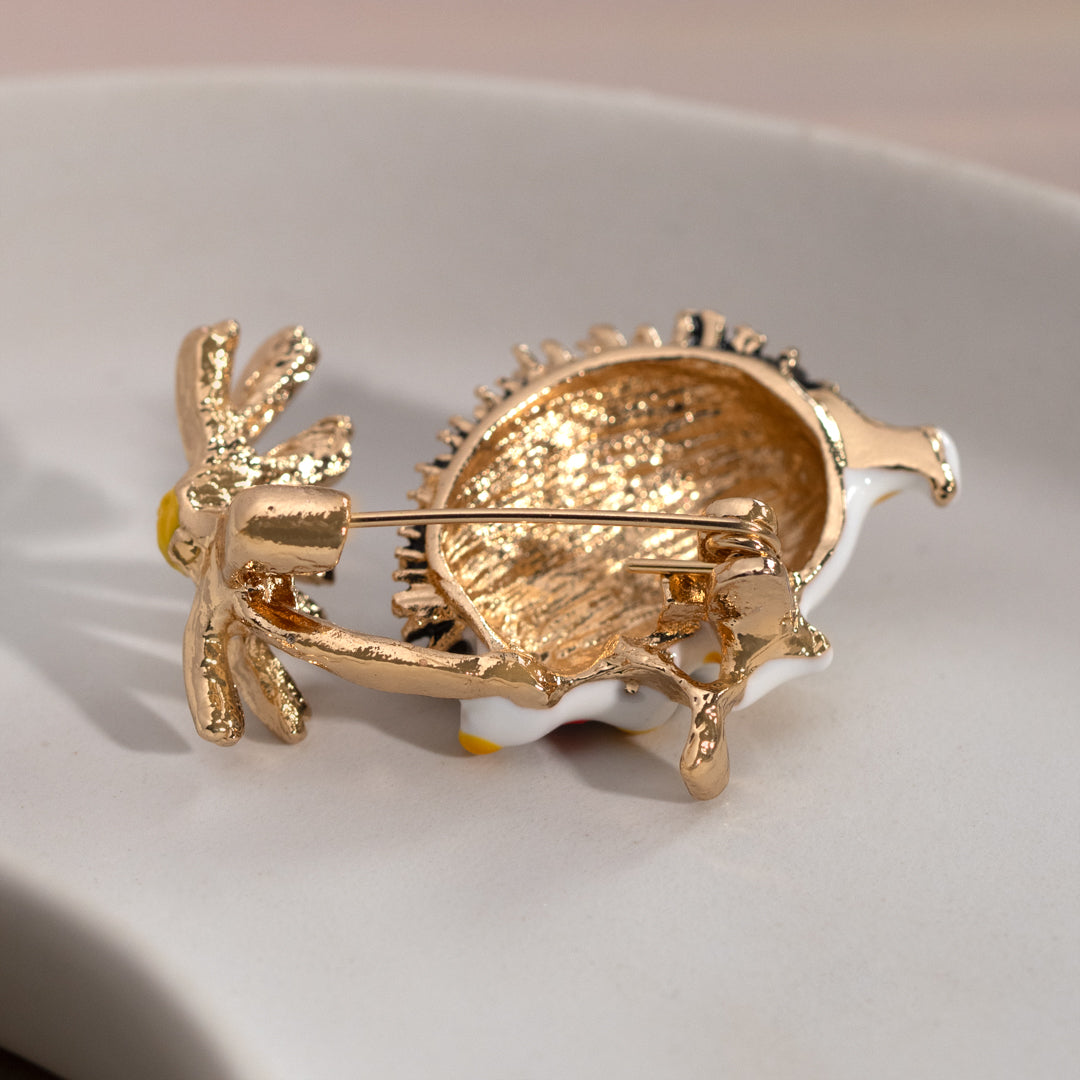 Hedgehog With Daisy Brooch