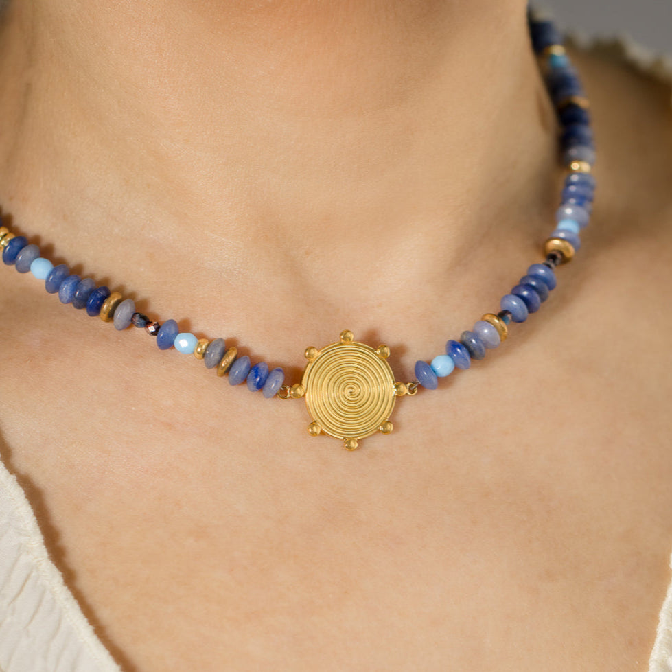 Blue Gemstone Bead And Gold Swirl Bracelet