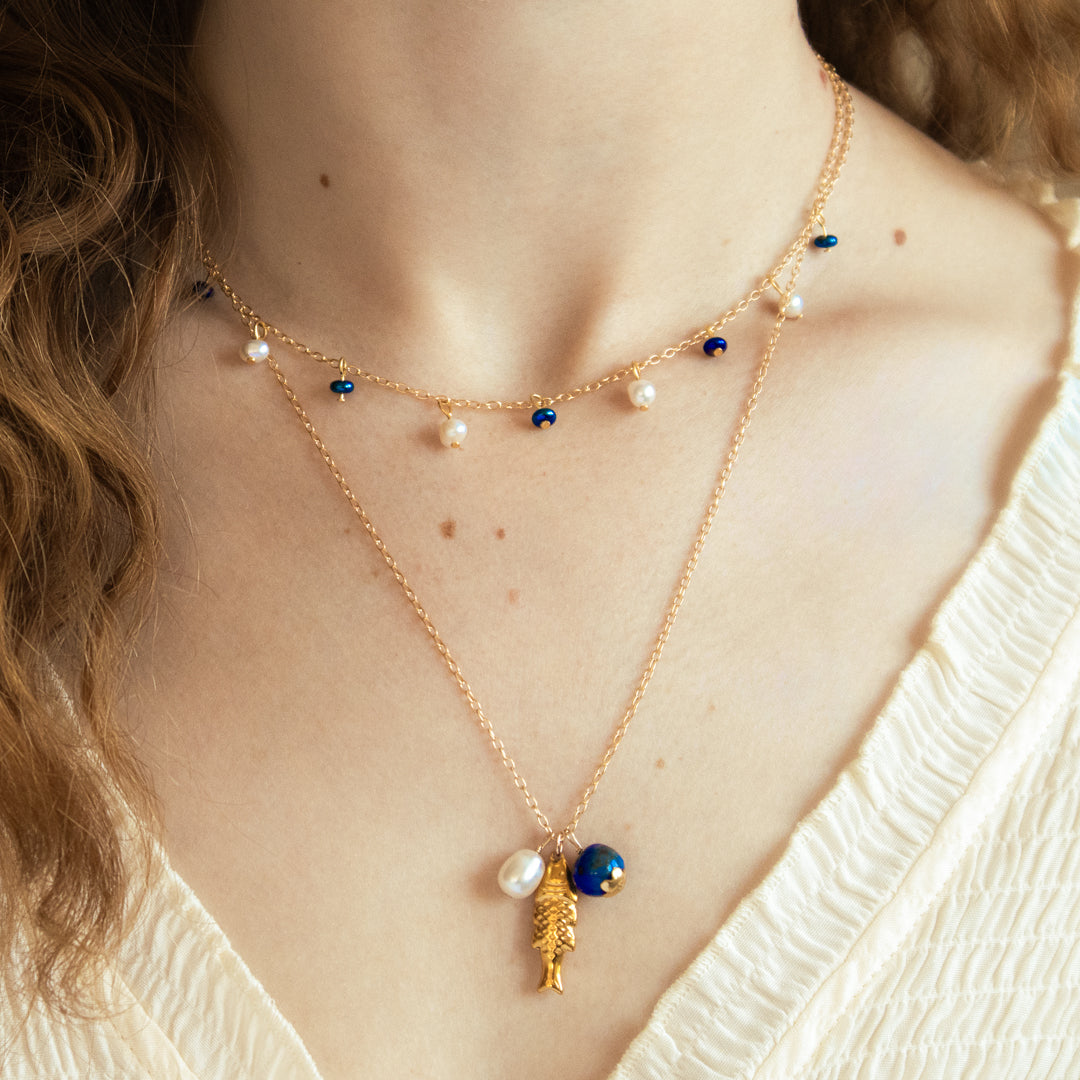 The Golden Fish Charm Bracelet