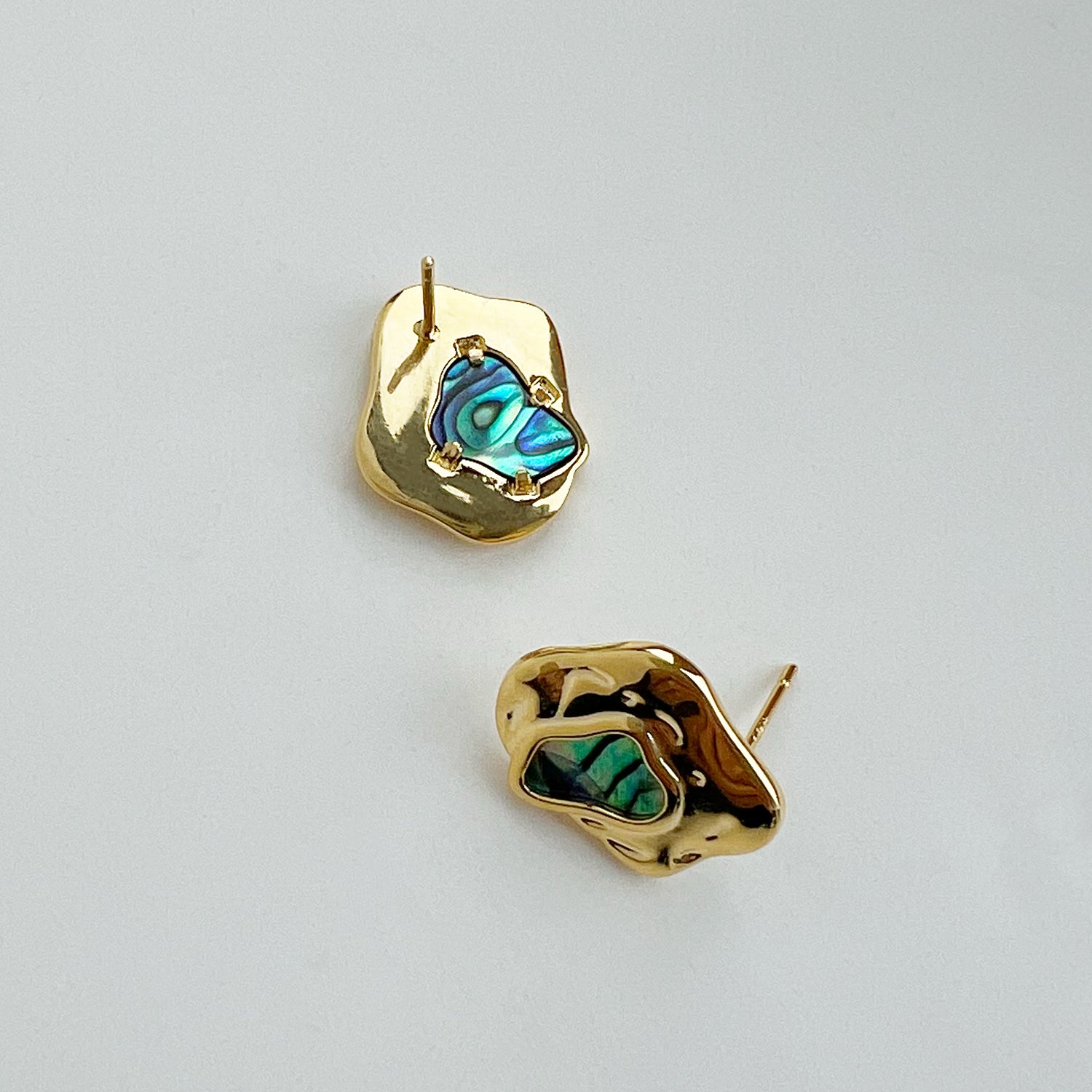 Close up view of Iridescent Abalone In Molten Metal Stud Earrings