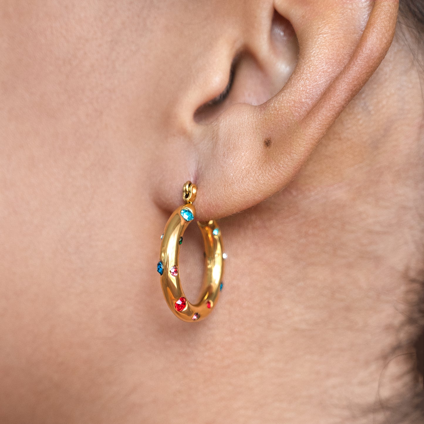 Dotted Colourful Gem Hoops Non Tarnish shown worn in a model's ear