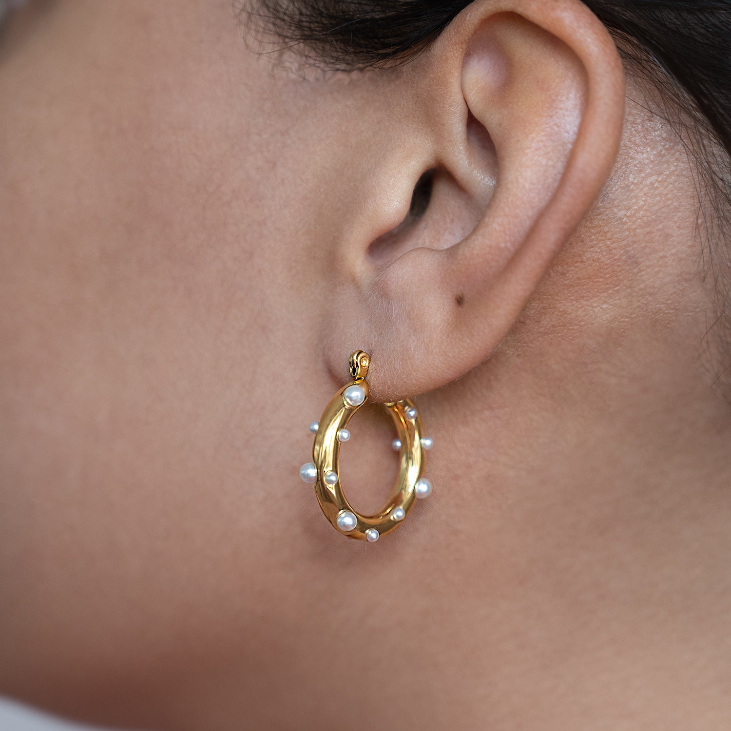 Dotted Pearl Hoop Earrings Non Tarnish shown worn in a model's ear