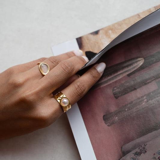 Irregular Clear Cabochon Ring shown worn on a model's finger