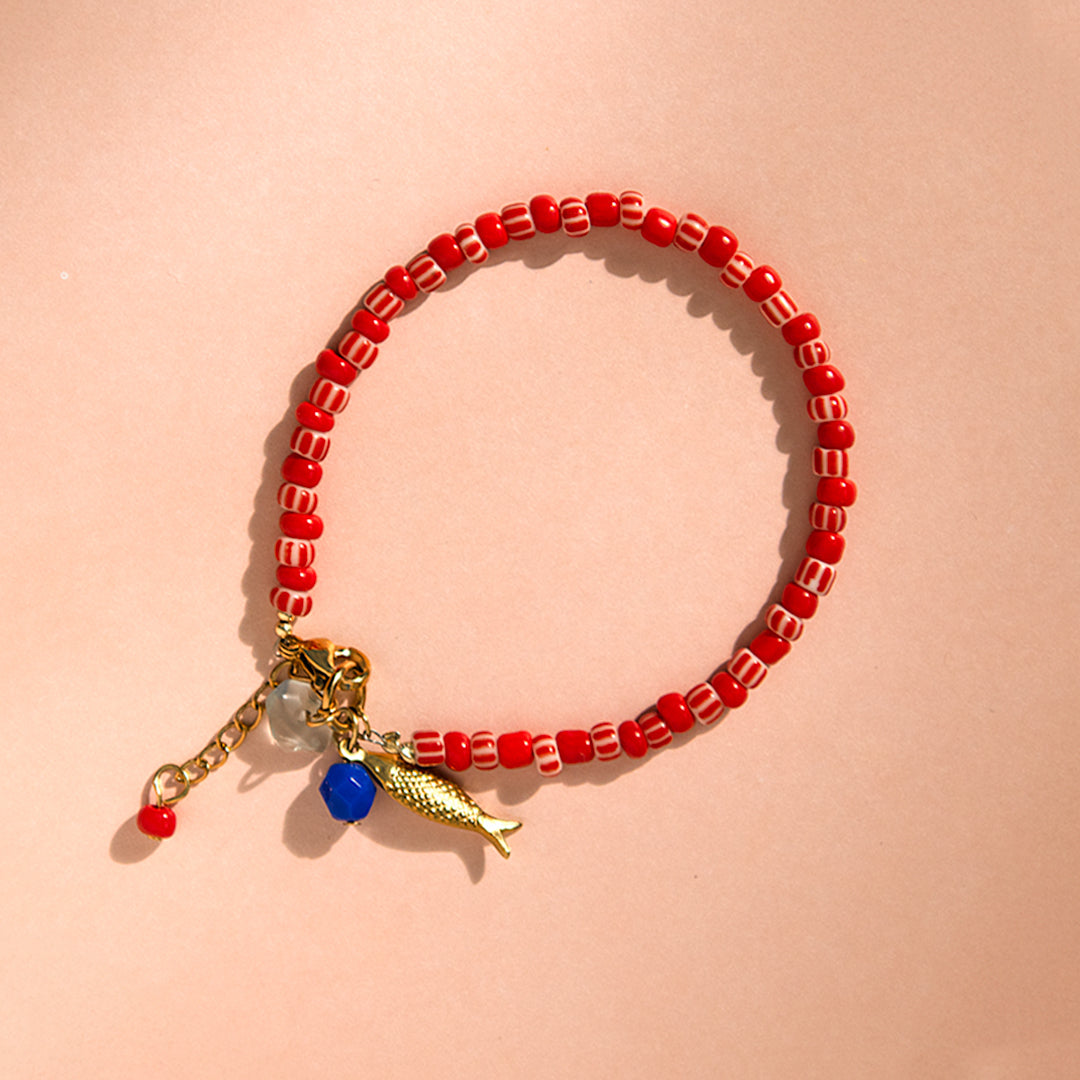 Red Candy Stripe Bead and Fish Charm Bracelet