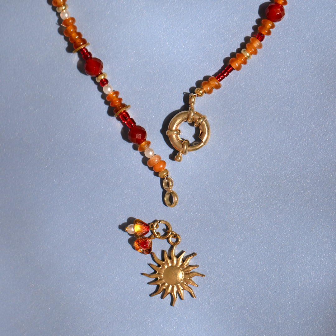 Carnelian Gemstone Bead And Sun Charm Necklace