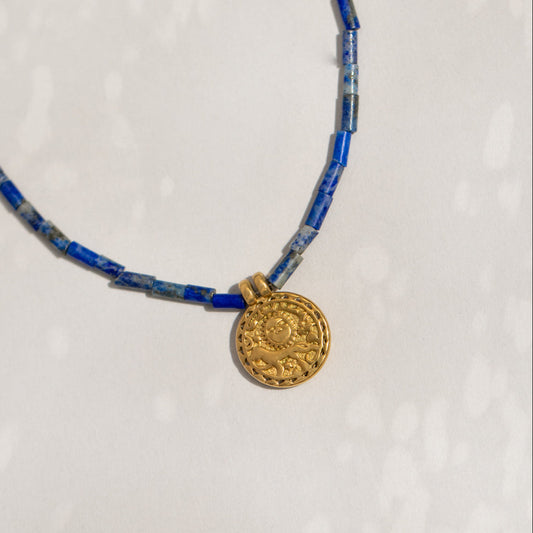 Blue Gemstone And Sun Talisman Coin Necklace