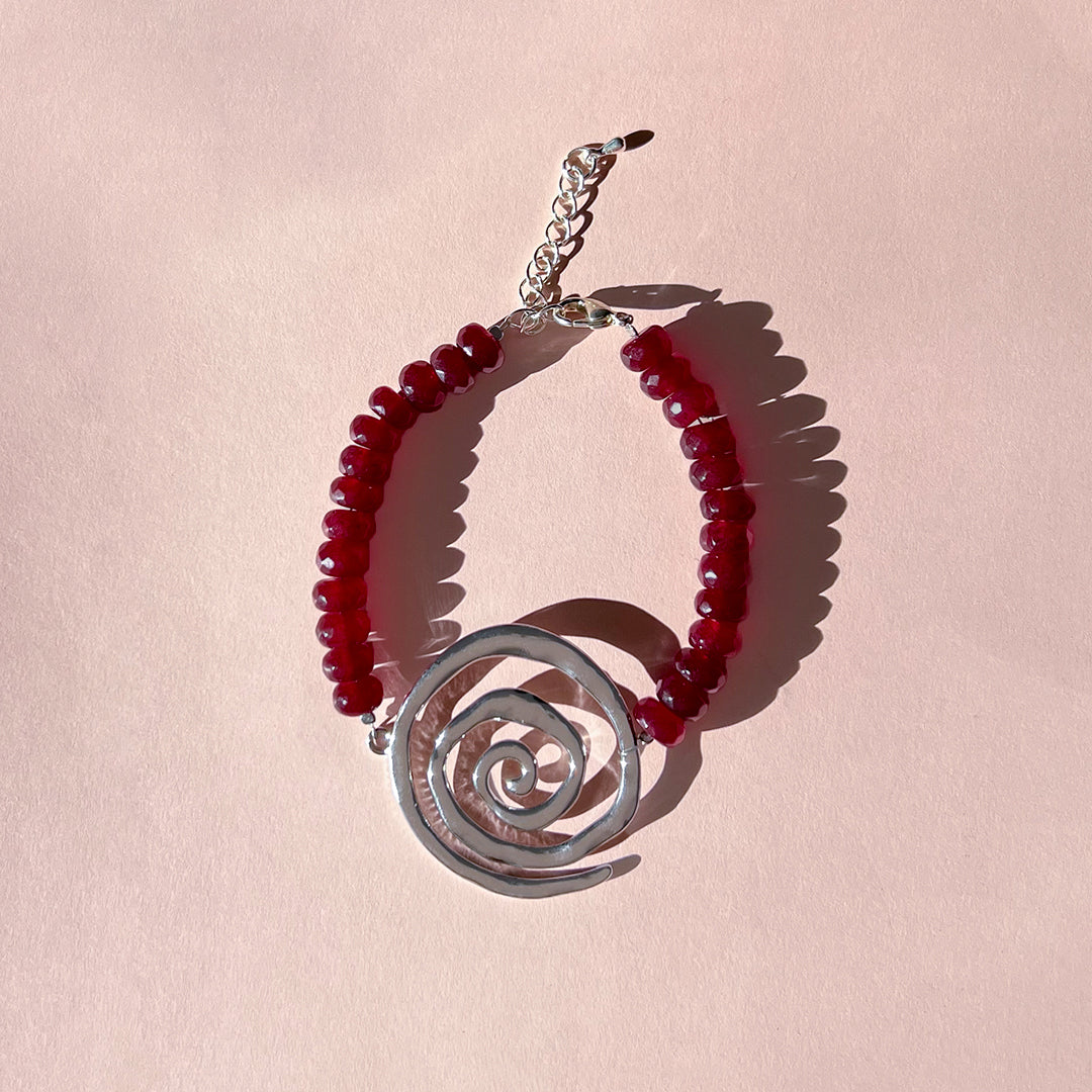 Red Gemstone and Spiral Bracelet