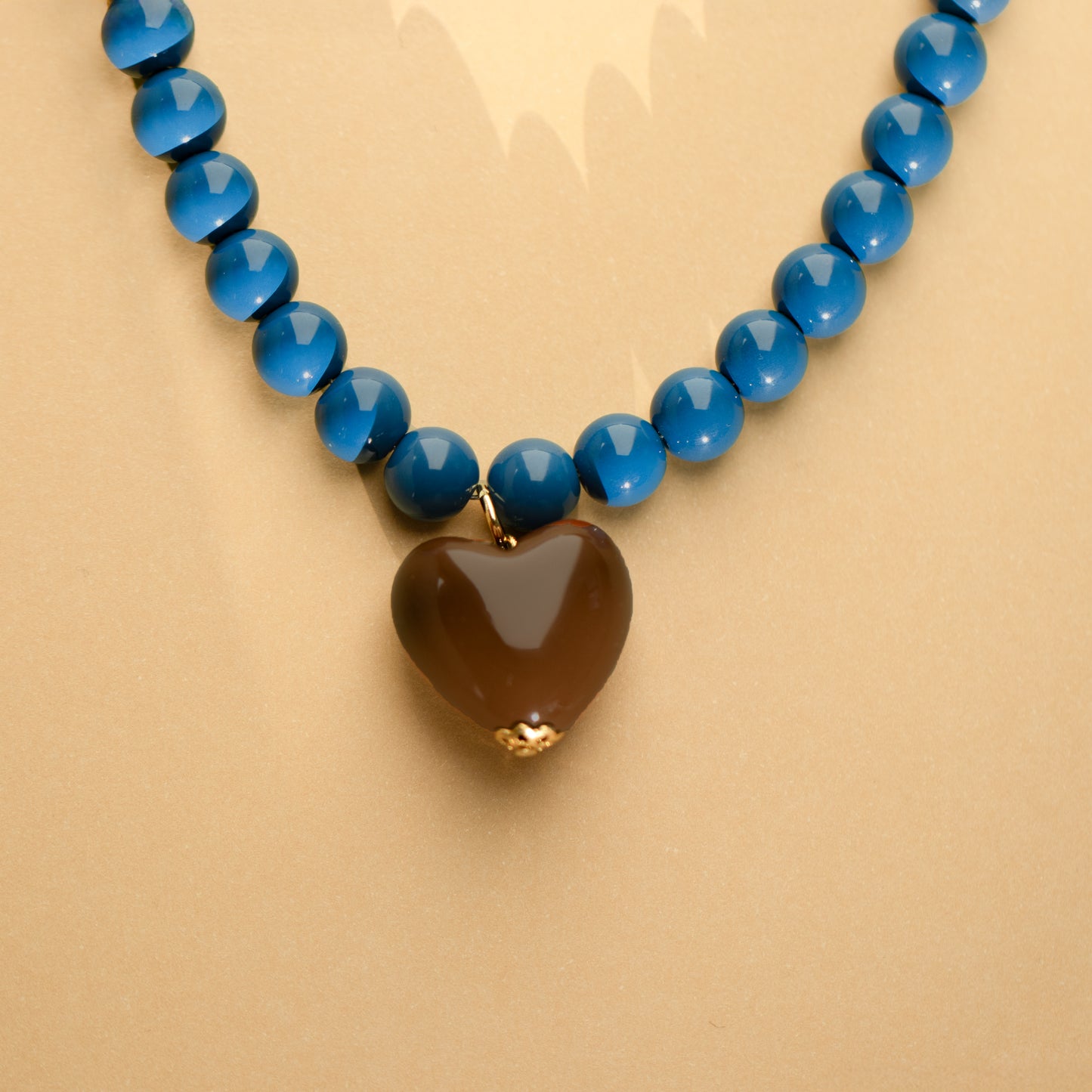 Peacock Blue Bead and Chocolate Heart Necklace