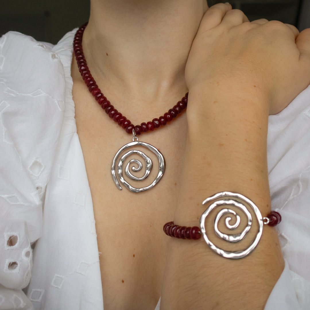 Red Gemstone and Spiral Bracelet